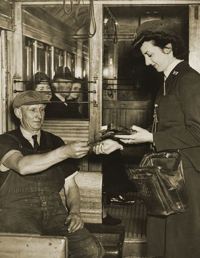VR conductress issuing ticket. Photograph State Library Victoria