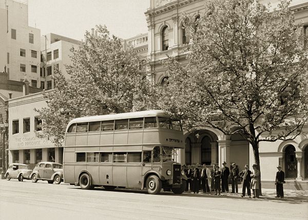Undated view of M&MTB Leyland Titan TD5c outside Selwyn Chambers, 505 Bourke Street. Photograph State Library Victoria