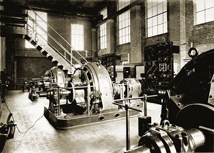 Interior of Elwood substation, the natural light showing the Westinghouse rotary converters and other electrical equipment to advantage. Photograph from the Lloyd Rogers collection.